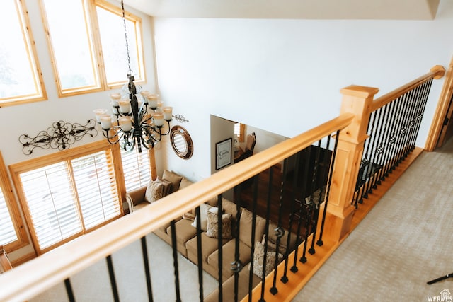 493 N 12500 W, Bluebell, UT 84007 - stairway with vaulted ceiling, light carpet, and a chandelier