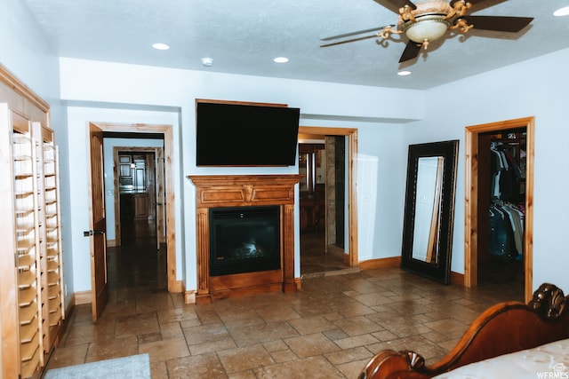493 N 12500 W, Bluebell, UT 84007 - unfurnished living room with dark tile flooring and ceiling fan