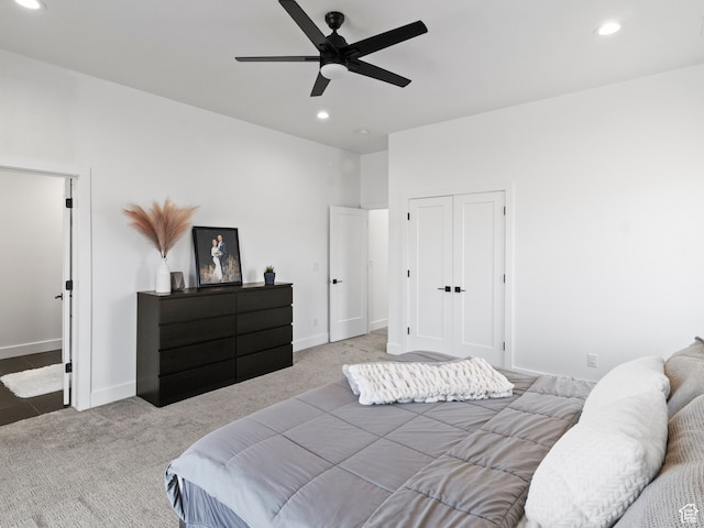2971 S Sand Trap Cir Unit 64, Garden City, UT 84028 - carpeted bedroom with a closet and ceiling fan