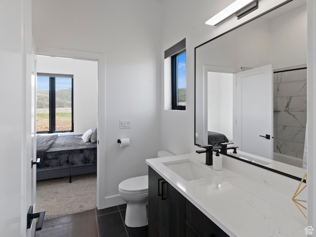 2971 S Sand Trap Cir Unit 64, Garden City, UT 84028 - bathroom with toilet, tile flooring, and vanity