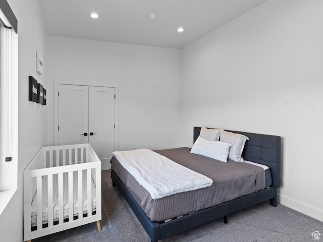 2971 S Sand Trap Cir Unit 64, Garden City, UT 84028 - carpeted bedroom featuring a closet