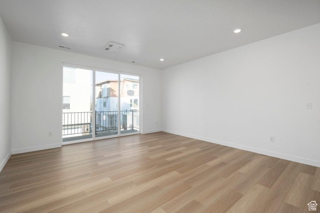 4119 S Winder Ward Dr E Unit 3-106, Millcreek, UT 84124 - unfurnished room featuring light wood-style flooring, baseboards, and recessed lighting