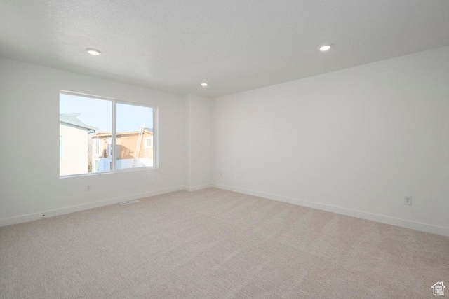 4119 S Winder Ward Dr E Unit 3-106, Millcreek, UT 84124 - empty room with light colored carpet, recessed lighting, and baseboards