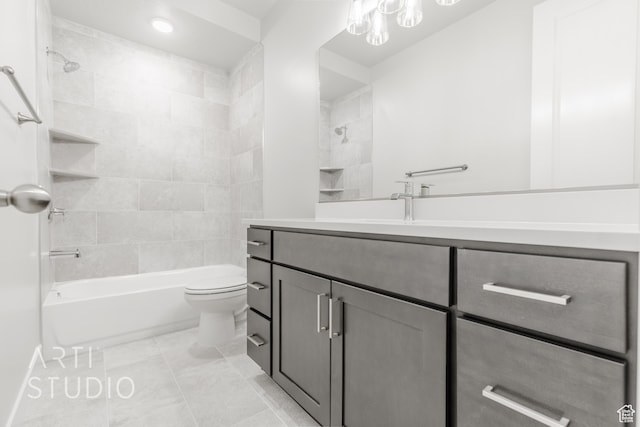 full bathroom with vanity, tiled shower / bath combo, toilet, and tile patterned floors