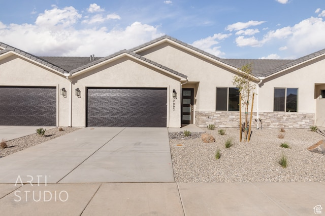 single story home with a garage