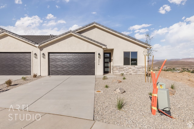 single story home featuring a garage