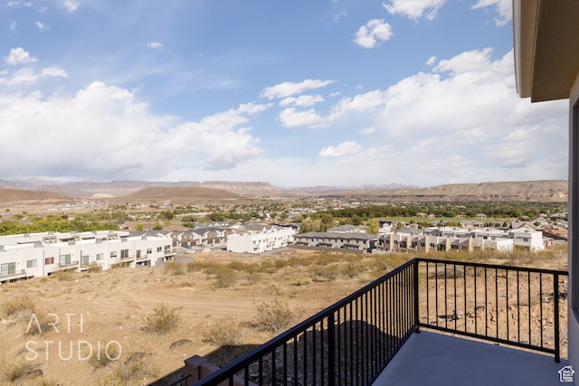 balcony featuring a mountain view