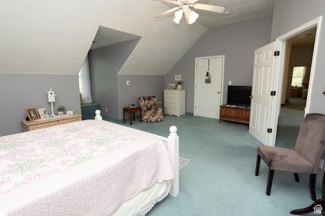bedroom featuring carpet floors, ceiling fan, and vaulted ceiling