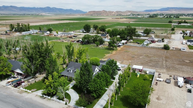 birds eye view of property with a mountain view