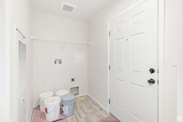 750 E 400 N Unit 220, Mount Pleasant, UT 84647 - laundry area featuring hookup for a washing machine, light hardwood / wood-style flooring, and electric dryer hookup