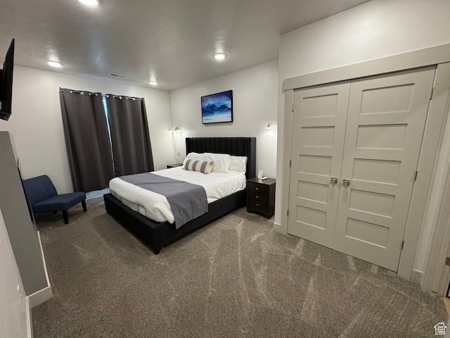 140 W 150 S Unit I32, Garden City, UT 84028 - bedroom with baseboards, dark colored carpet, and recessed lighting