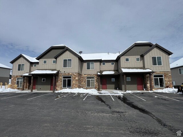140 W 150 S Unit I32, Garden City, UT 84028 - multi unit property featuring stone siding, uncovered parking, and board and batten siding