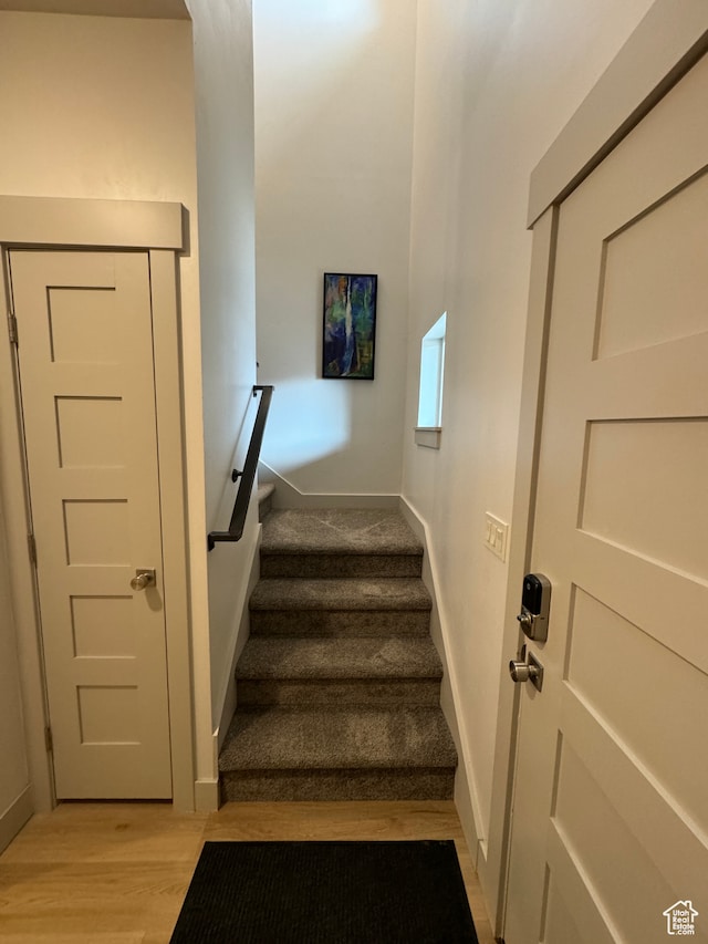 140 W 150 S Unit I32, Garden City, UT 84028 - stairway featuring wood finished floors and baseboards
