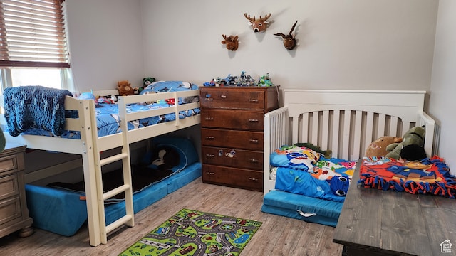 bedroom featuring light wood-type flooring