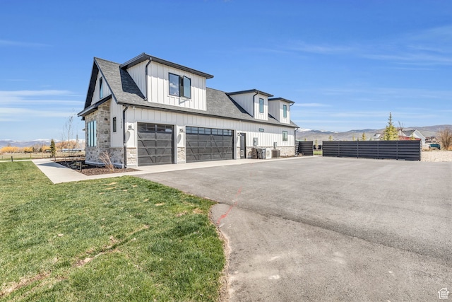 1429 S Hallam Rd Unit 2, Francis, UT 84036 - exterior space featuring a front lawn and a garage