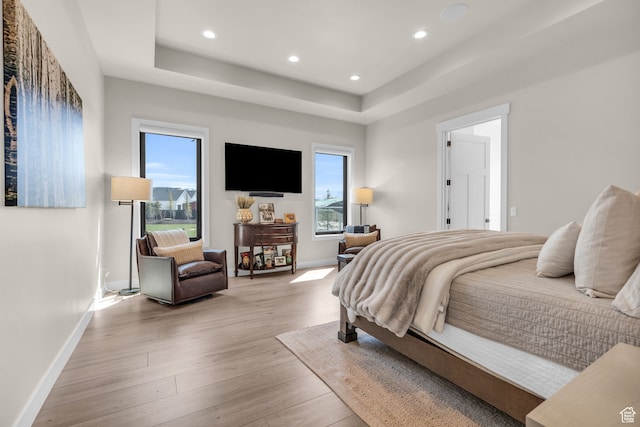 1429 S Hallam Rd Unit 2, Francis, UT 84036 - bedroom featuring light wood-type flooring and a tray ceiling