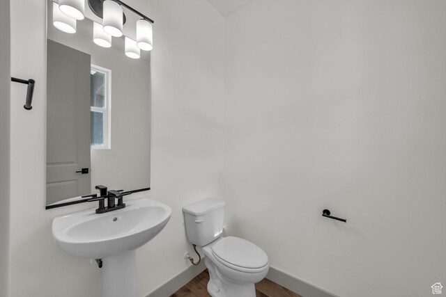 664 Pine Canyon Rd, St George, UT 84790 - bathroom featuring toilet and hardwood / wood-style floors