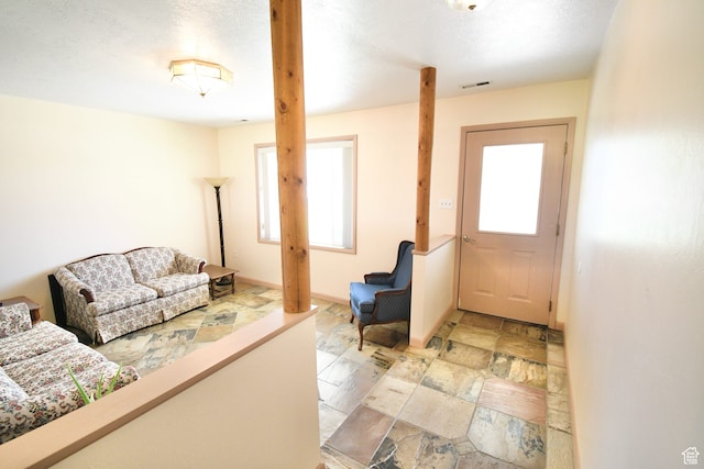 75 E 300 N, Glenwood, UT 84730 - foyer entrance featuring a textured ceiling and light tile flooring
