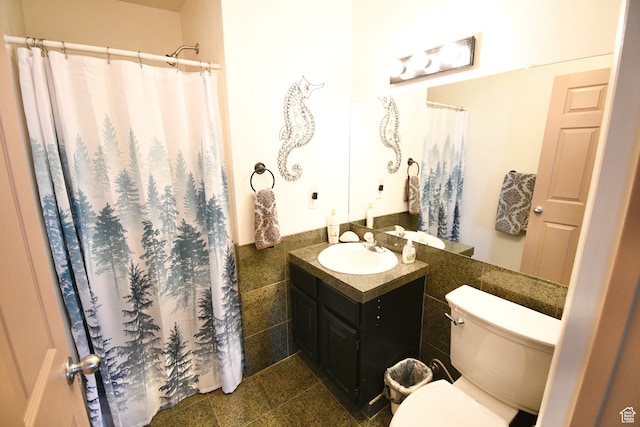 75 E 300 N, Glenwood, UT 84730 - bathroom with toilet, oversized vanity, tile walls, and tile flooring