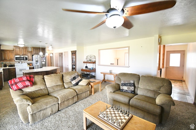 75 E 300 N, Glenwood, UT 84730 - living room with ceiling fan and light tile floors