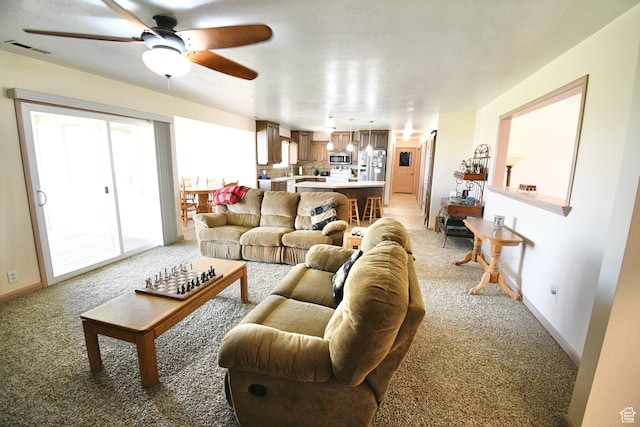 75 E 300 N, Glenwood, UT 84730 - living room featuring ceiling fan and carpet floors