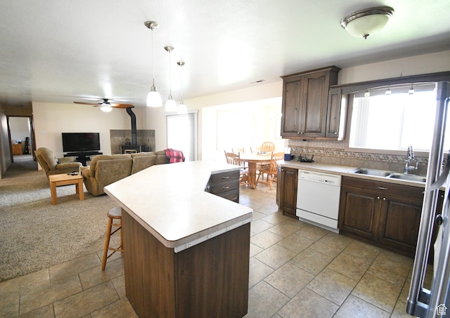 75 E 300 N, Glenwood, UT 84730 - kitchen featuring a wealth of natural light, white dishwasher, and light tile floors