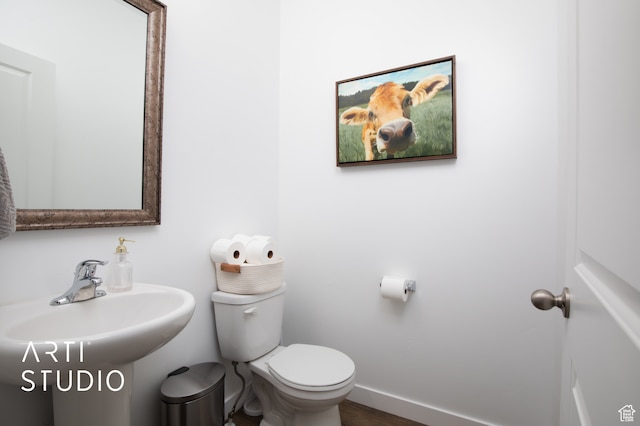 bathroom featuring toilet