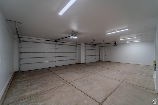 723 S 1220 W Unit 34, Hurricane, UT 84737 - garage featuring a garage door opener