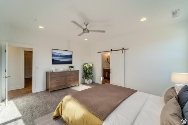723 S 1220 W Unit 34, Hurricane, UT 84737 - carpeted bedroom with a barn door, visible vents, baseboards, and recessed lighting