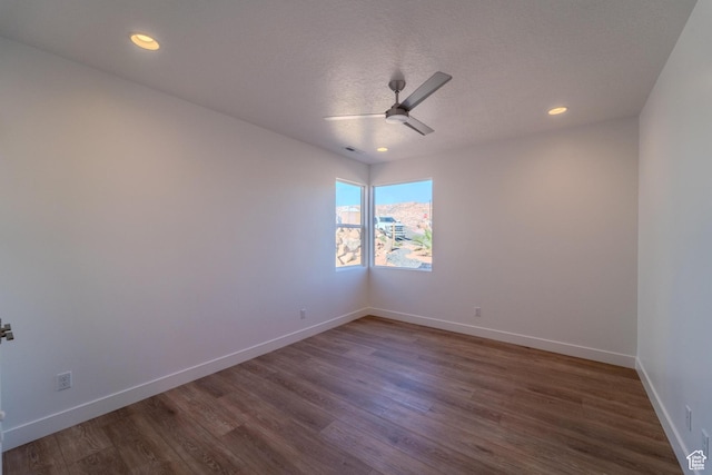 723 S 1220 W Unit 34, Hurricane, UT 84737 - empty room featuring a textured ceiling, recessed lighting, dark wood-type flooring, a ceiling fan, and baseboards