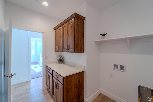 723 S 1220 W Unit 34, Hurricane, UT 84737 - clothes washing area featuring light wood finished floors, hookup for a washing machine, recessed lighting, cabinet space, and baseboards