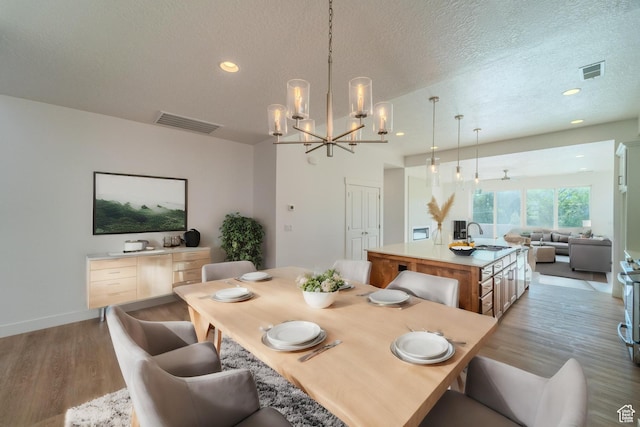 723 S 1220 W Unit 34, Hurricane, UT 84737 - dining area featuring light wood-type flooring, visible vents, a textured ceiling, and recessed lighting