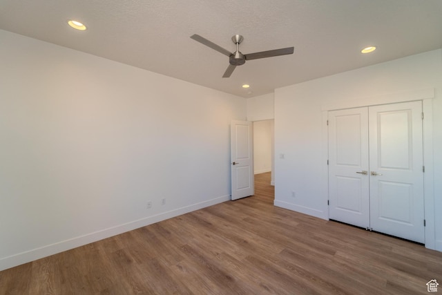 723 S 1220 W Unit 34, Hurricane, UT 84737 - unfurnished bedroom featuring a closet, recessed lighting, wood finished floors, and baseboards