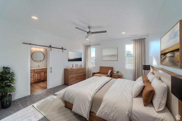 723 S 1220 W Unit 34, Hurricane, UT 84737 - bedroom featuring carpet, recessed lighting, a barn door, ensuite bath, and baseboards