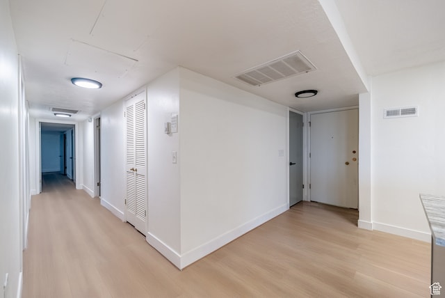 875 S Donner Way Unit 1203, Salt Lake City, UT 84108 - hall featuring light hardwood / wood-style floors