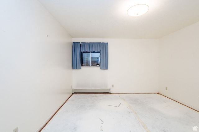 1560 E 1580 N, Logan, UT 84341 - spare room featuring a baseboard heating unit