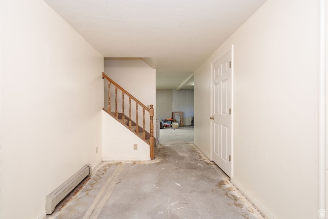 1560 E 1580 N, Logan, UT 84341 - interior space with concrete flooring and a baseboard radiator
