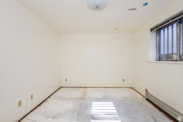 1560 E 1580 N, Logan, UT 84341 - empty room featuring a baseboard heating unit