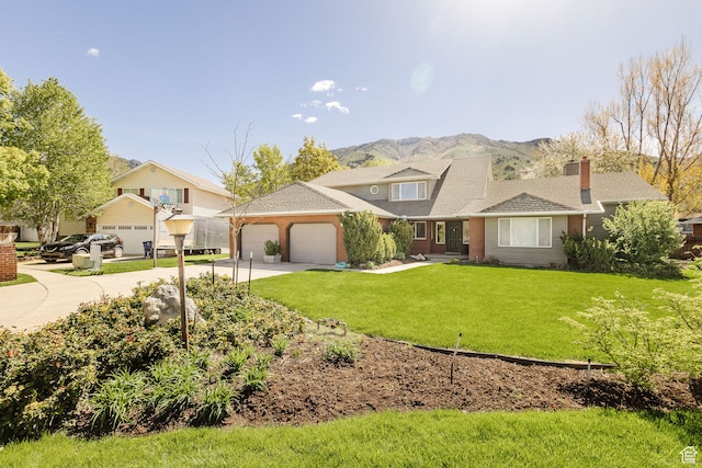 1560 E 1580 N, Logan, UT 84341 - view of front of home featuring a mountain view and a front lawn