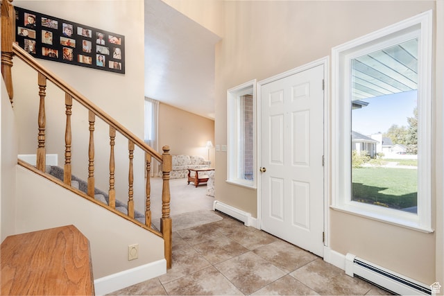 1560 E 1580 N, Logan, UT 84341 - foyer with a baseboard heating unit and light tile flooring