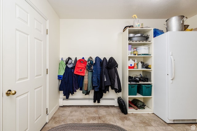 1560 E 1580 N, Logan, UT 84341 - mudroom featuring light tile flooring and a baseboard heating unit