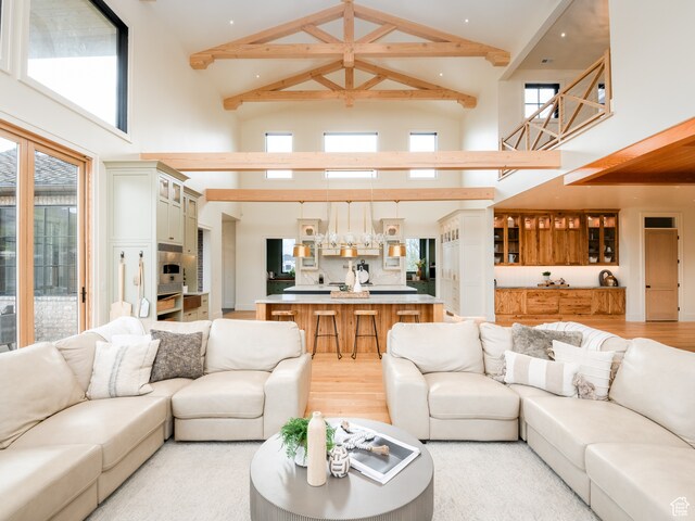 616 E Stokes Ave S, Draper, UT 84020 - living room featuring high vaulted ceiling and light hardwood / wood-style floors