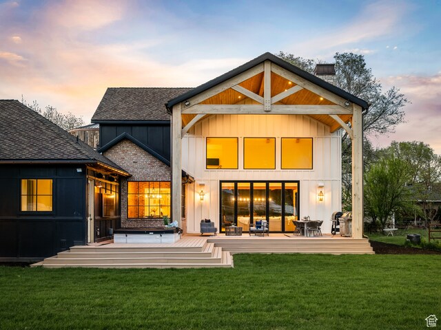 616 E Stokes Ave S, Draper, UT 84020 - back house at dusk with central AC and a lawn
