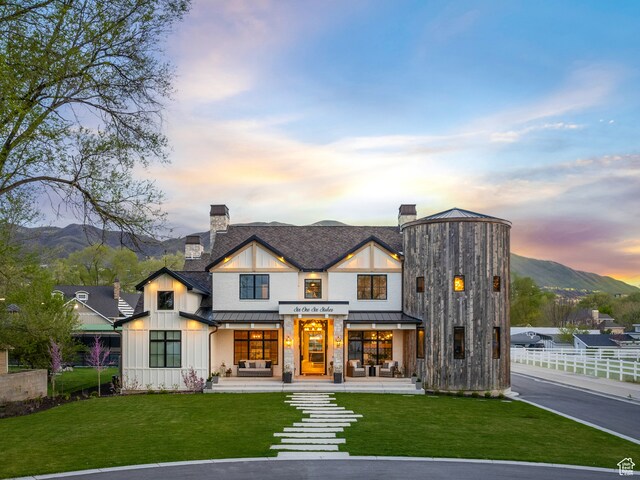 616 E Stokes Ave S, Draper, UT 84020 - back house at dusk with a mountain view and a yard