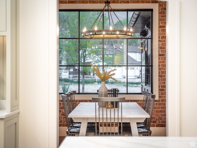 616 E Stokes Ave S, Draper, UT 84020 - dining area with a notable chandelier and a healthy amount of sunlight