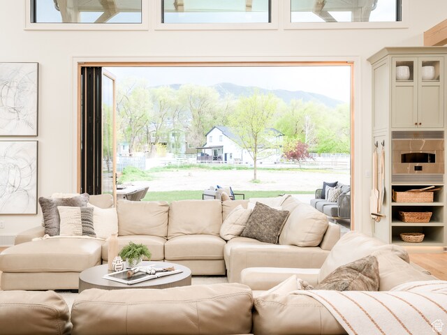 616 E Stokes Ave S, Draper, UT 84020 - living room with wood-type flooring and a mountain view