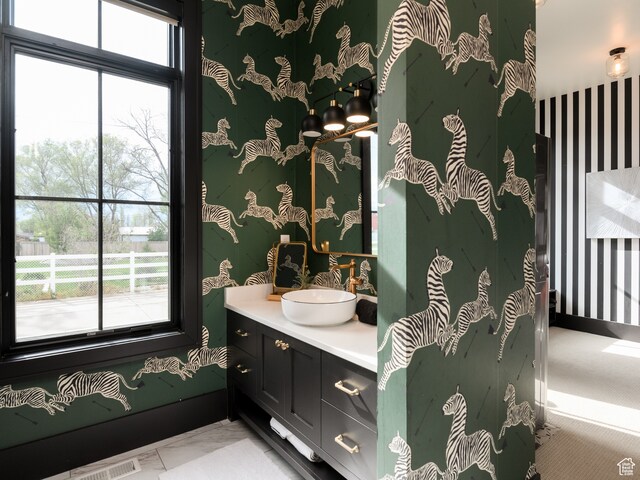 616 E Stokes Ave S, Draper, UT 84020 - bathroom with tile flooring, vanity, and a wealth of natural light