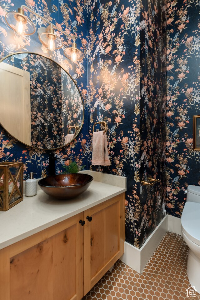 616 E Stokes Ave S, Draper, UT 84020 - bathroom featuring tile flooring, vanity, and toilet