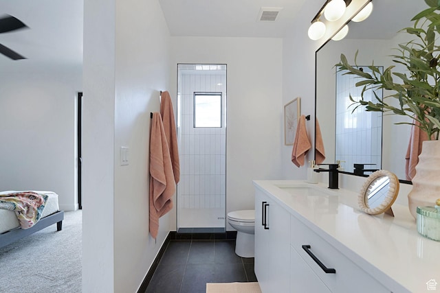 400 S Moki Dr Unit I-1, Kanab, UT 84741 - bathroom with vanity, a tile shower, tile patterned floors, and ceiling fan