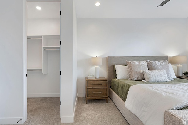 400 S Moki Dr Unit I-1, Kanab, UT 84741 - bedroom featuring a walk in closet, light colored carpet, a closet, and recessed lighting